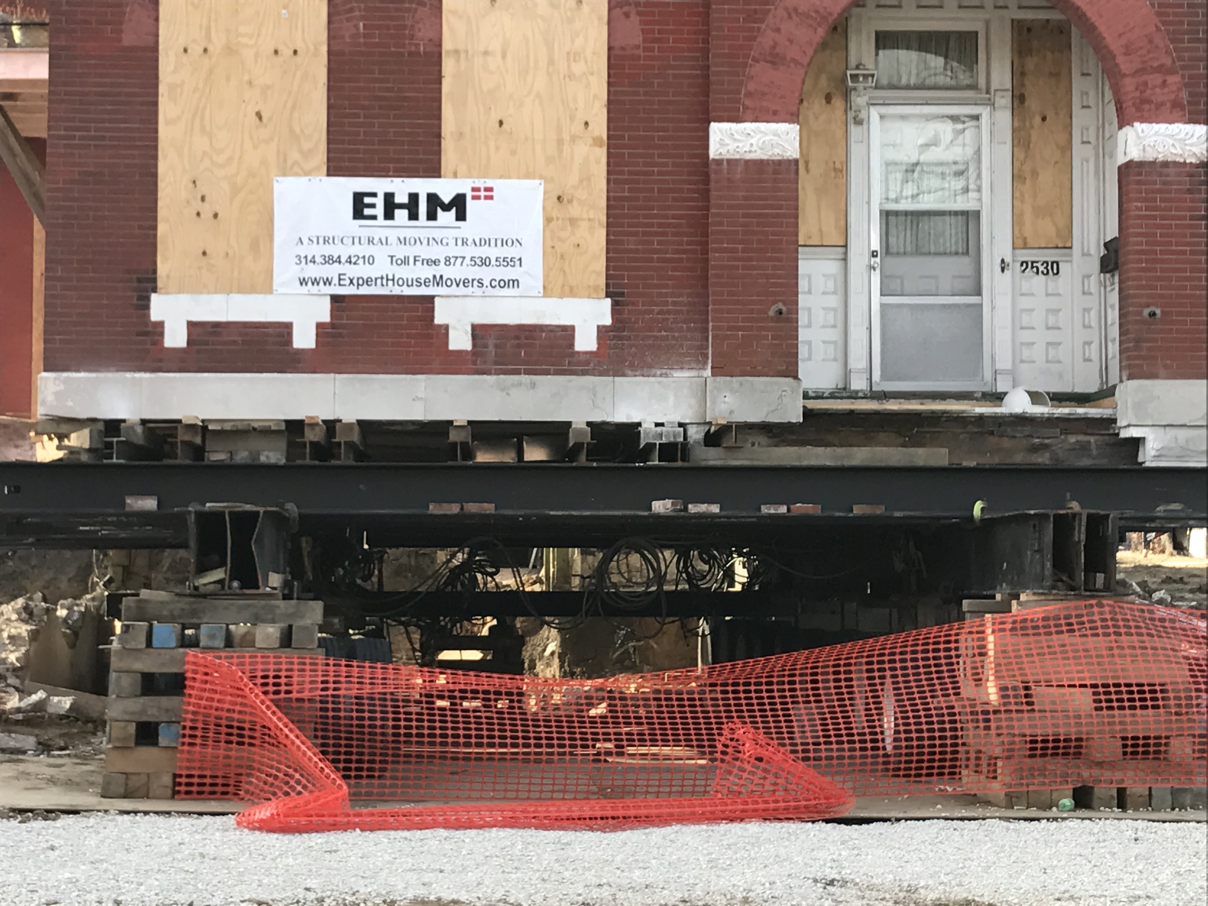 A close up view of a home at 2530 North Market Street being prepared to be moved to a new location to make way for the Next NGA site preparation.